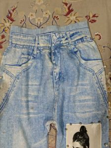 Light Wash Distressed Jeans with Pearl Detail