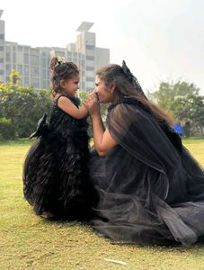 Elegant Black Tulle Gown with Cape Sleeves