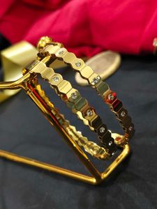 Elegant Gold Hexagonal Bangles with Crystals