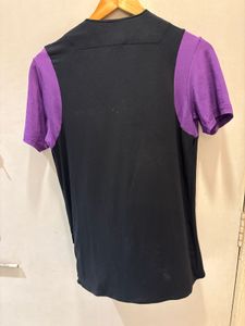 Goth Vest Over Purple Tee