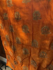 Vibrant Orange with Peacock Motif dress material