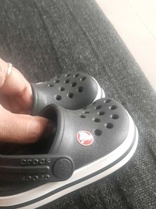 New black unisex bayaband Crocs for babies
