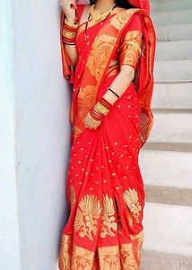 Elegant Red Saree with Gold Motifs