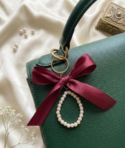 Elegant Pearl &amp; Bow Keychain Charm