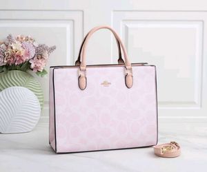COACH**12A QUALITY HANDBAG* AT OFFER PRICE