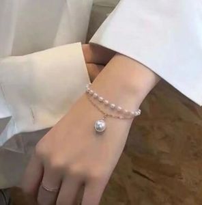 Elegant Pearl Charm Bracelet