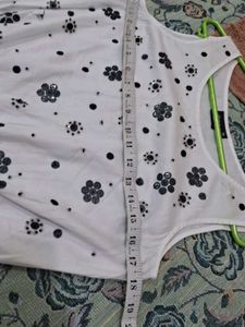 White Sleeveless Top with Floral Print