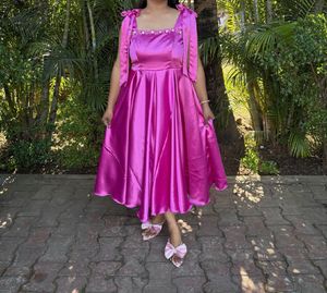 Stunning Fuchsia Satin Dress with Bows