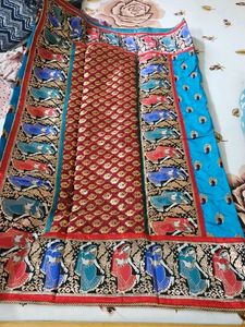 Blue Embroidered Saree with Dancing Figures