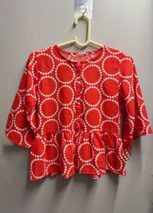 Vibrant Red Peplum Top with Circles