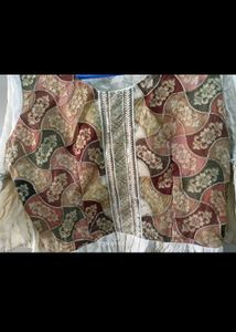 cream colour gharara and top with dupatta