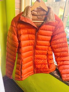 Orange puffer packable jacket