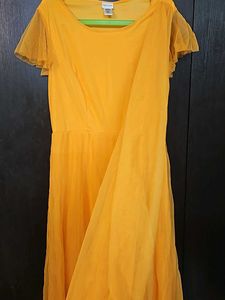 Beautiful Yellow Partywear Gown With Net Pallu