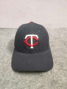 New Era Black Baseball Cap with T.C. Logo
