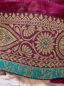 Vibrant Pink saree with Golden Print