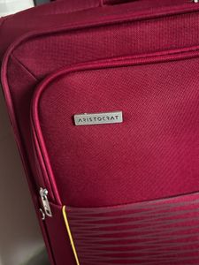 Red Rolling Luggage Suitcase