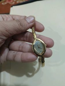 Elegant Gold Bangle Watch
