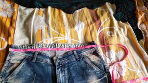 Distressed Blue Denim Jeans