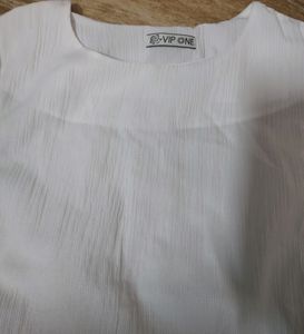 White Top With Shoulder Frill And Knot Style.