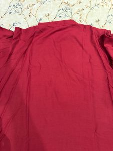 maroon kurta.