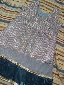 Sparkling frock with comfortable trouser .
