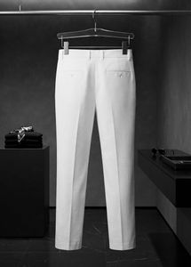 Classic White Pleated Trousers