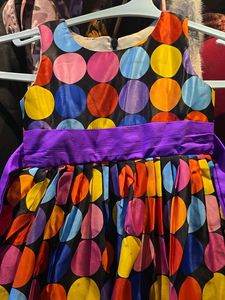 Vibrant Polka Dot Dress with Purple Accents
