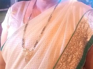 Beautiful Cream And Green Colour Net Saree Golden