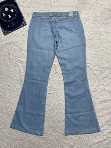 Light Wash Flared Jeans with Embellishments