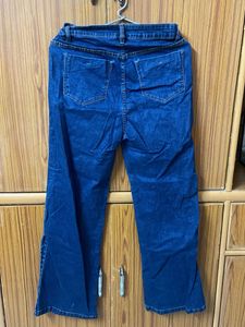High-Waisted Flare Jeans with Button Detail
