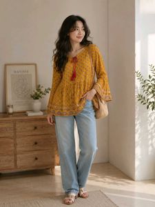 Yellow Printed Peplum Kurti with Bell Sleeves
