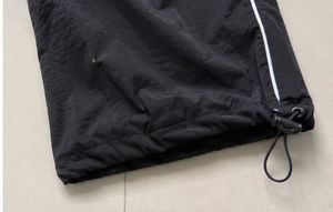 Black Track Pants with White Stripes