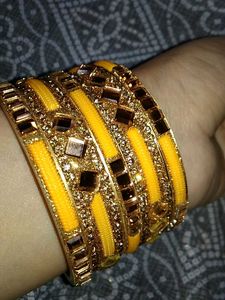 Exquisite Yellow & Gold Embellished Bangles