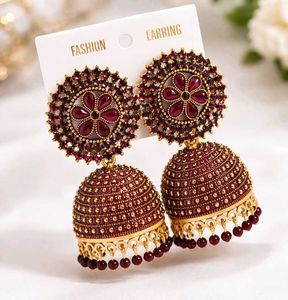 Premium Jhumka Earrings - Gold Finish
