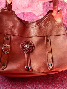 Women orange Handbags