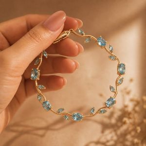 Elegant Gold Bracelet with Blue Stones