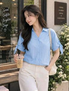 New with tag Cute Light Blue Button-Up Top