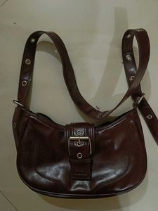 brown sling bag