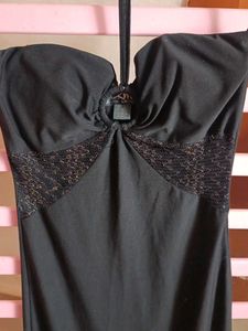 Chic Black Halter Dress with Ruffle Hem