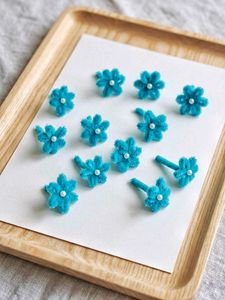 12 Pcs Teal Pipe Cleaner Flower Embellishments