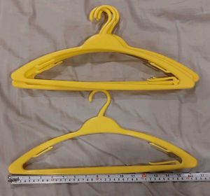 Set of 6 Yellow Plastic Hangers