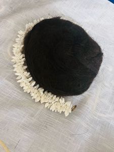 Traditional Hair Bun with Floral Garland