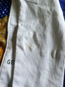 Black Shirt; White Pant And Velvet Type Pan