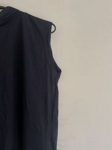 Sleek Black Mock Neck Sleeveless Top