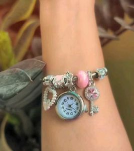 Charming Rose Gold Charm Bracelet Watch