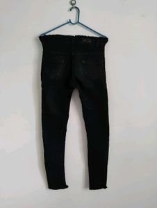 Stylish Black Jeans with Frayed Hem
