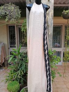 Halter neck sleek beige sequinned gown