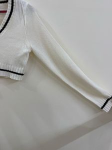 White Knit Sweater with Black Trim