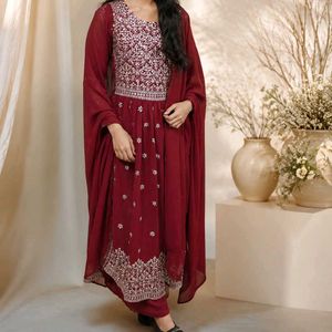 Stunning Red Embroidered Naira Cut Suit