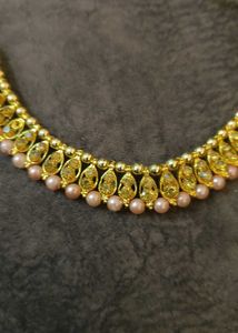Elegant Gold-Tone Necklace with Pink Pearls